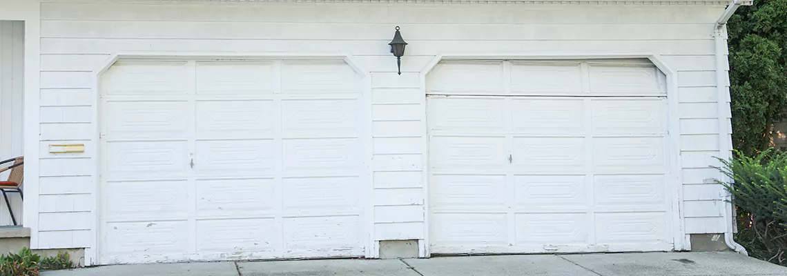 Roller Garage Door Dropped Down Replacement in North Miami Beach, FL